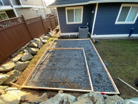 Beautiful Exposed Aggregate Hot Tub Pad with Landscaping