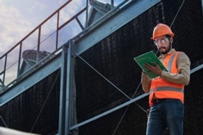 enginner-inspecting-cooling-tower.jpg
