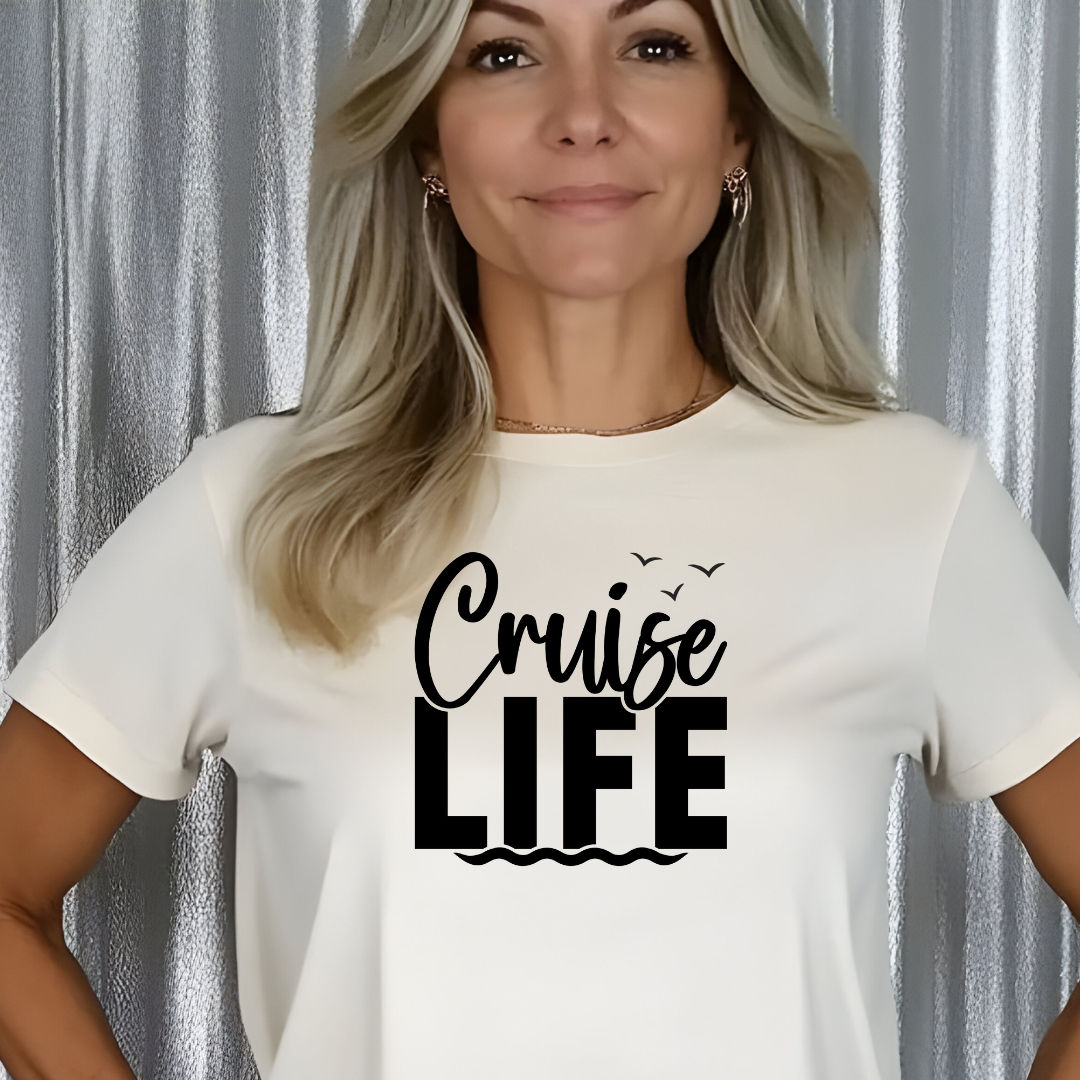 Woman wearing a cream tee with the words “Cruise LIFE” Her Pirate Couple's Cruise Tee.