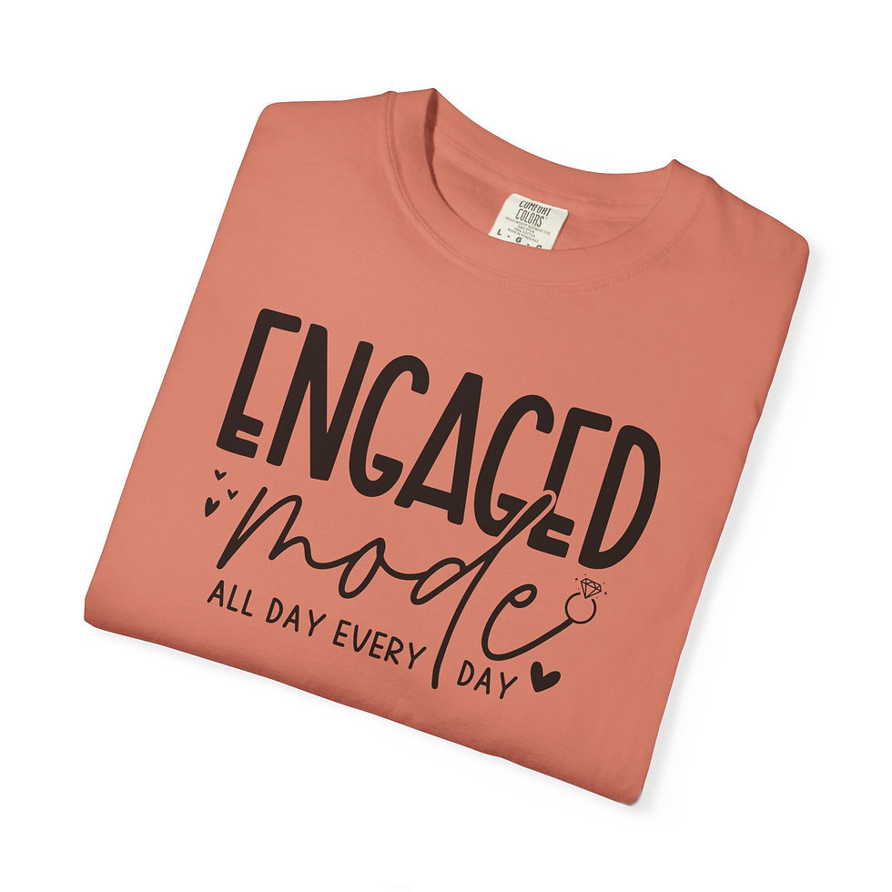 Thumbnail: Orange t-shirt with text: ENGAGED MODE ALL DAY EVERY DAY.