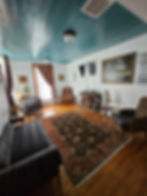 The living room of the top floor on the finished side of the haunted Magnolia Hotel.