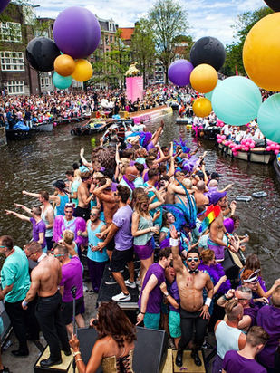 Embracing Love's Spectrum: Dive into Amsterdam's Pride with Sapiens Travel
