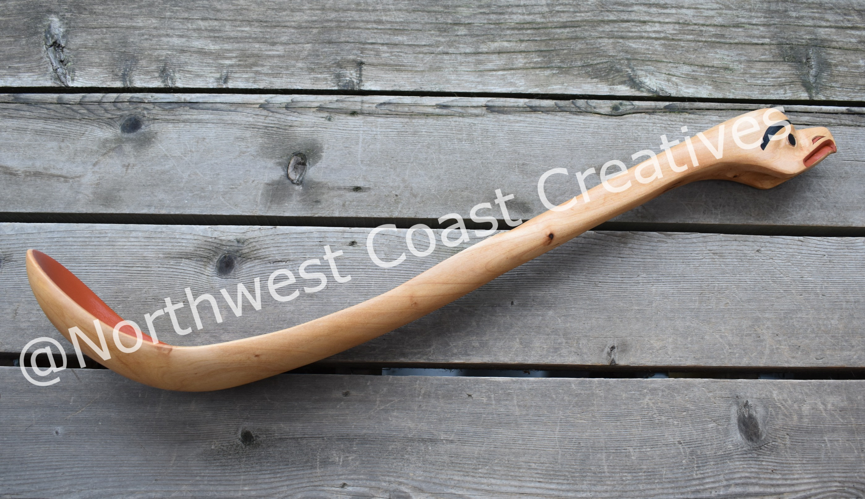 Red Ochre Eagle, ladle by Angelo C and Veronica W