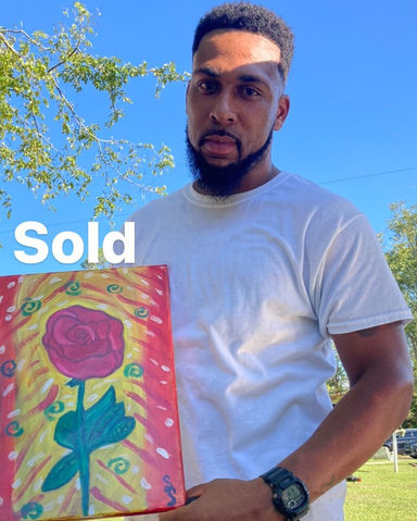 Artist Shakeyla Shinholster sells an original painting. 