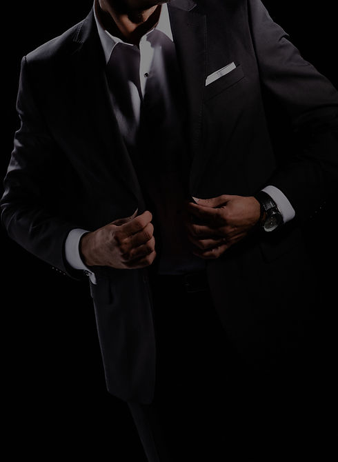 cropped-view-of-businessman-adjusting-lapels-of-ja-2023-11-27-05-12-06-utc_edited.jpg