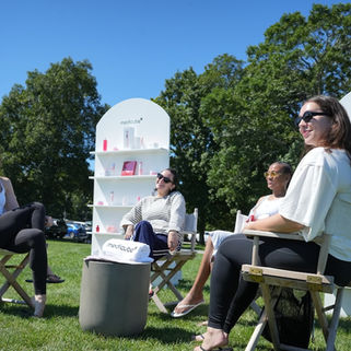 Beauty and lifestyle guests gather within Medicube’s branded wellness environment at Montauk Yacht Club.