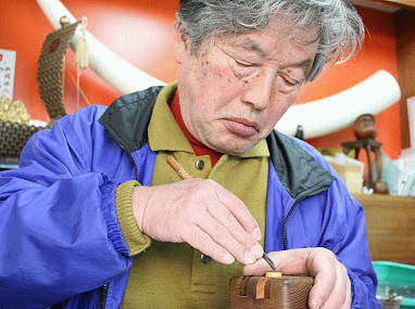 店主写真・検定合格証書の写真