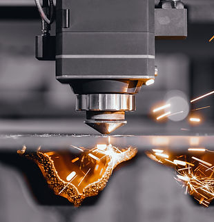 Laser CNC cut of metal with light spark..jpg