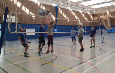 jumping to return the volleyball