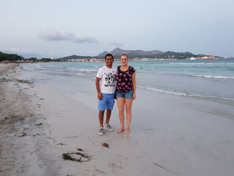 with wife on beach in portugal