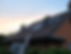 Roofers working on UK house.jpg