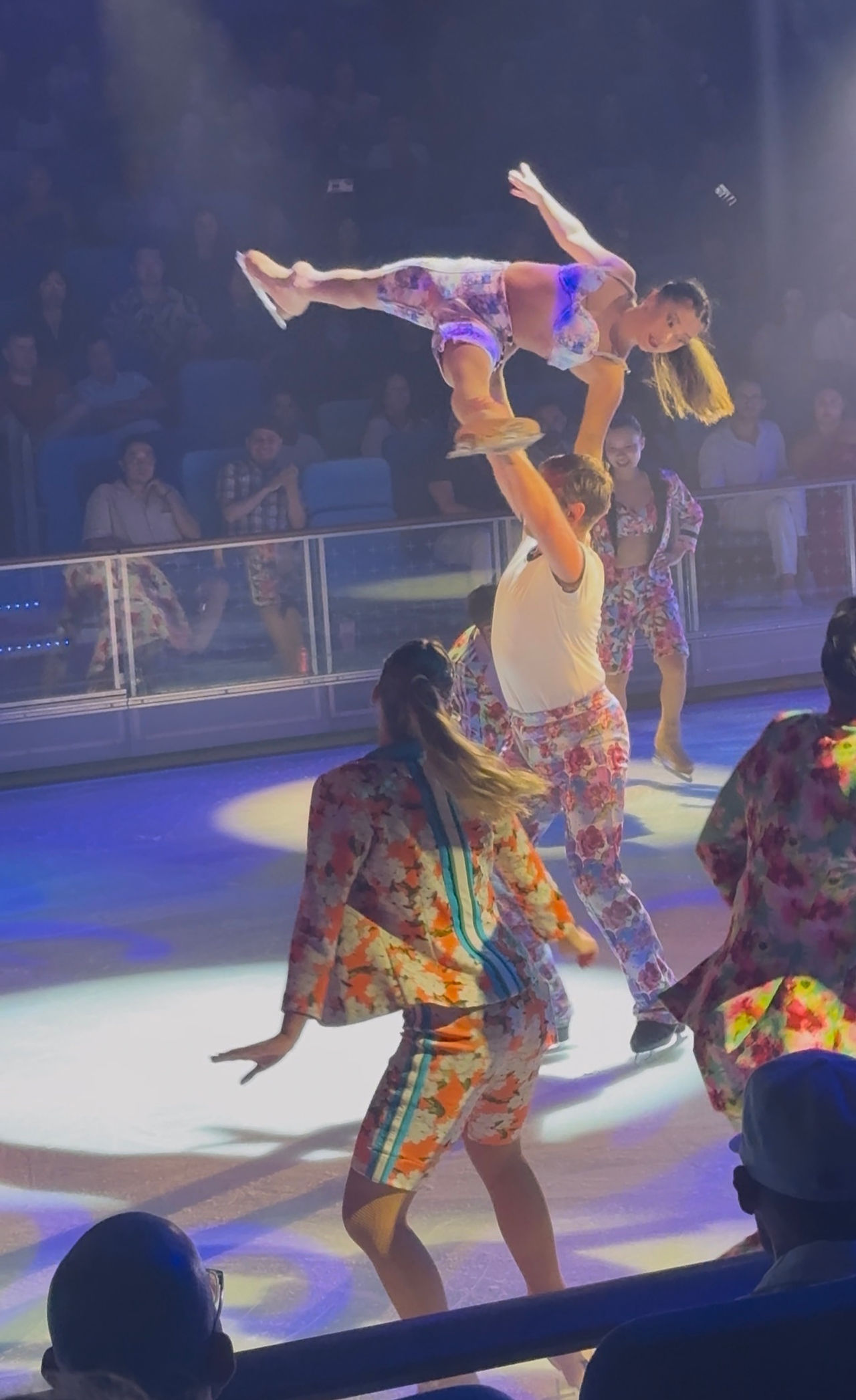 skater held in air by partner