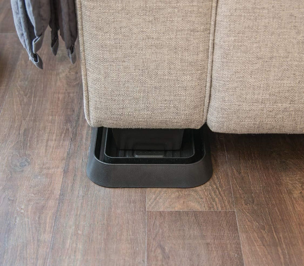 Thumbnail: Gray sofa with a Bedbug Blocker Square on the wooden floor for pest control.