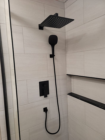 modern shower with opaque tiles and black modern valve with rain head