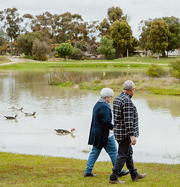 Couple walking in front of Lake Roberts Lameroo