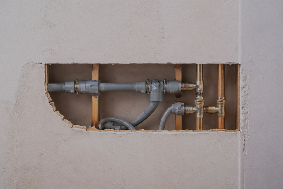Plumbing behind wall