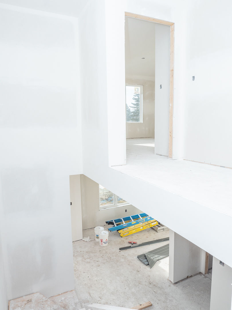 detailed drywall installation around openings framing Calgary precise wall finishing