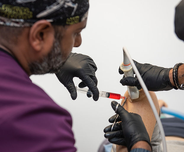 Dr. Gayan Poovendran Performing Prolotherapy at PRO Institute Poovendran Regenerative Orthopedics