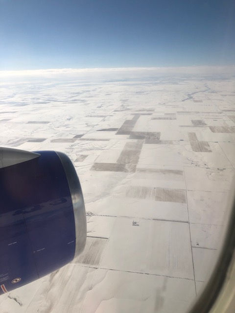 flying. southwest. snow on ground