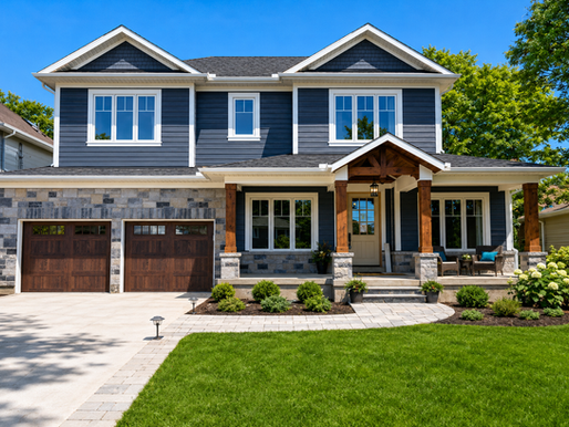 Elegant two-story home featuring a charming Cape Cod wood siding, expertly completed by CanMac Siding.