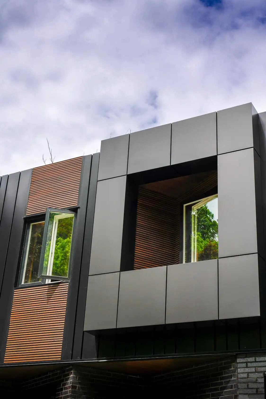 ACM Metal siding on a modern home