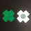 Thumbnail: Green Glitter Cross Nipple Pasties one reversed black background