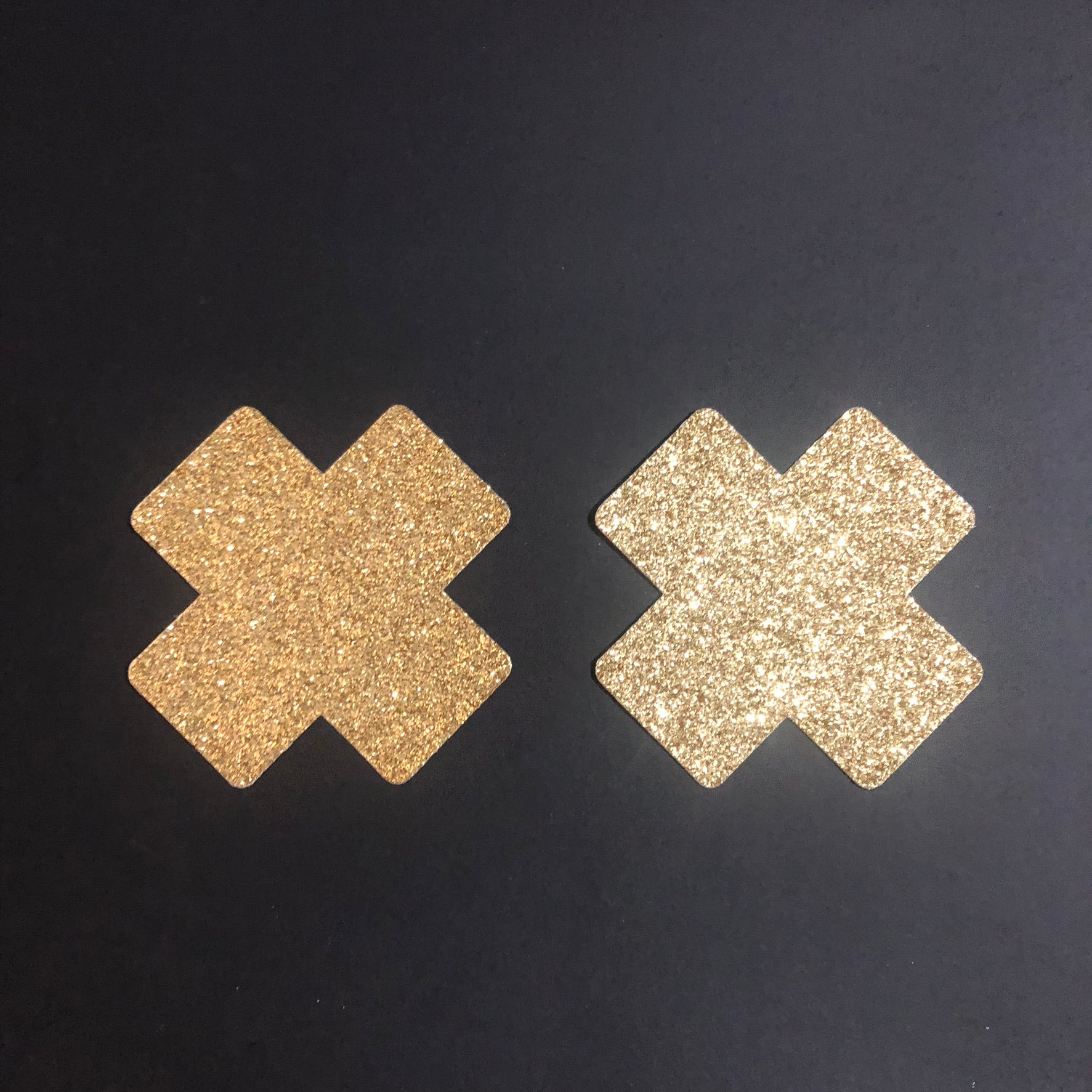 Antique Gold Glitter Cross Nipple Pasties black Background