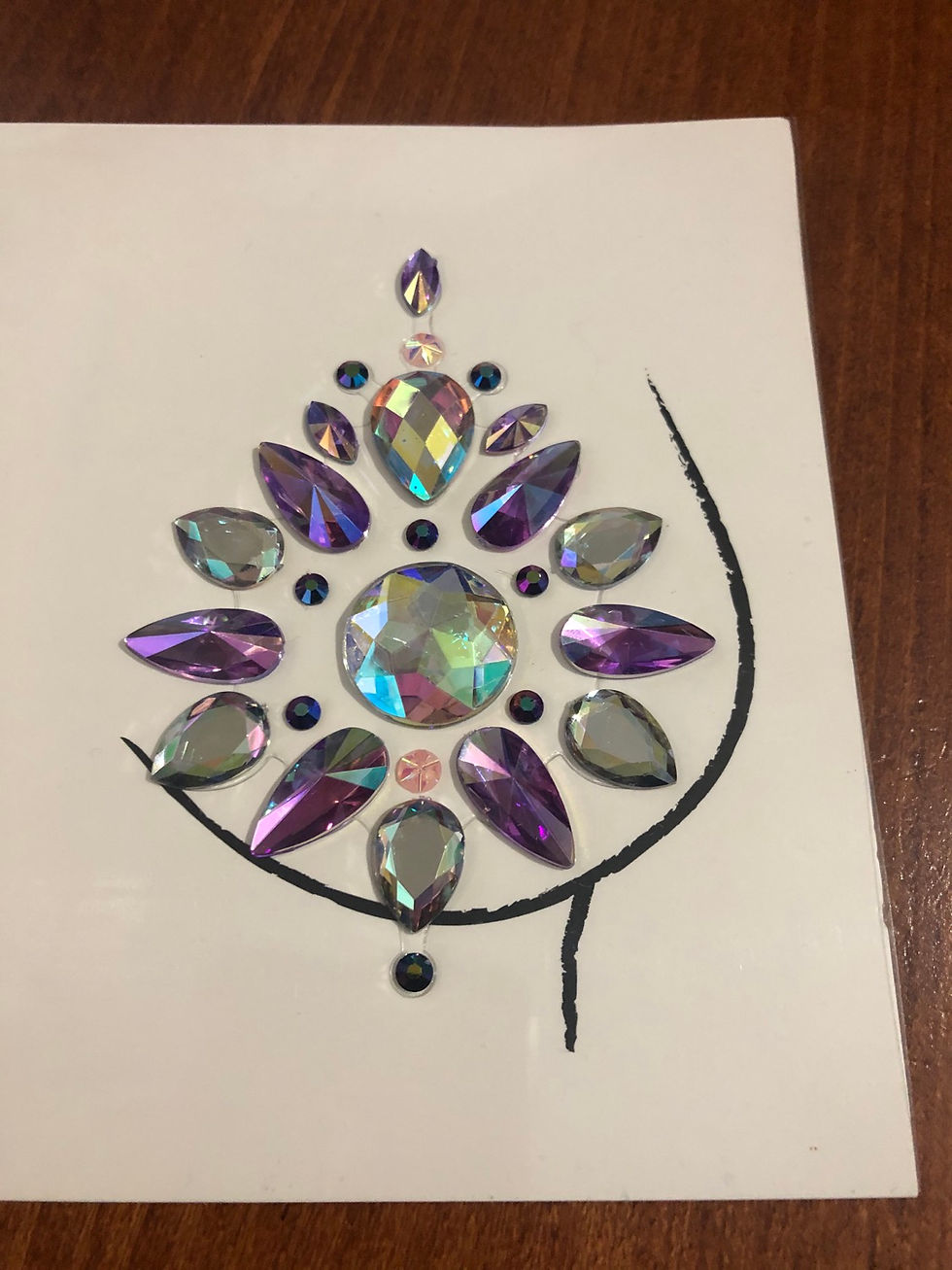 Reusable nipple pastie gems in purple crystals close up
