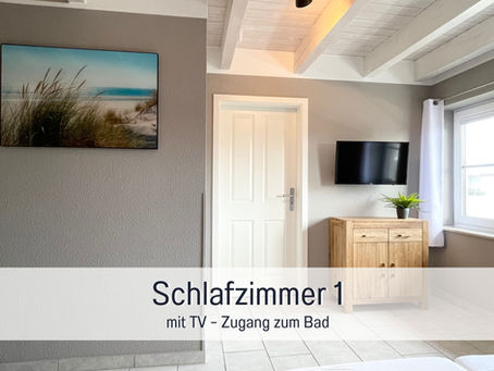 Lieblingsinsel Rügen – Ferienhaus Meerestraum Schlafzimmer TV Meerblick Doppelzimmer Ostsee