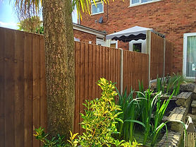 Cocrete posts, wooden fencing in Barnehurst.