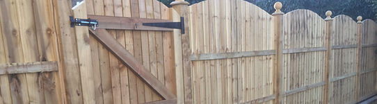 Luxury arch top timber fencing installed in Bexley Village.