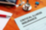 Critical Illness Insurance form and stethoscope.