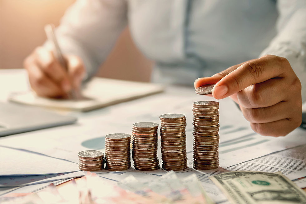 Financial Fortress_business woman hand holding coins to stack on desk concept saving money finance and accounting