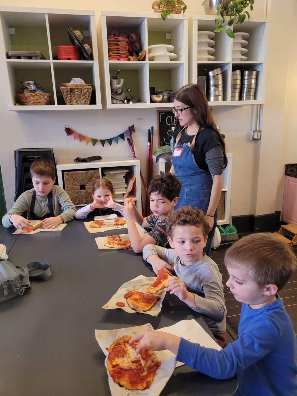 Students eating pizza in Wicker park