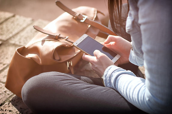 Photo by Tofros.com from Pexels https://www.pexels.com/photo/bag-electronics-girl-hands-359757/