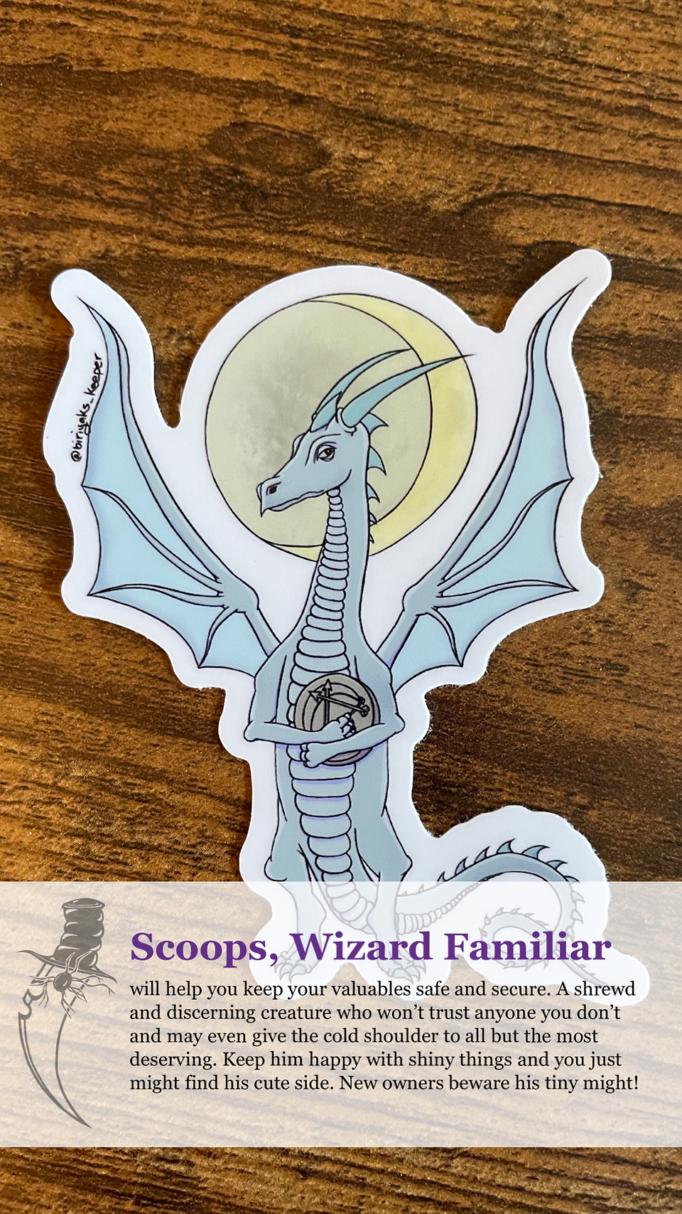 Sticker of a dragon wizard familiar holding a moon weaver coin with the moon behind him