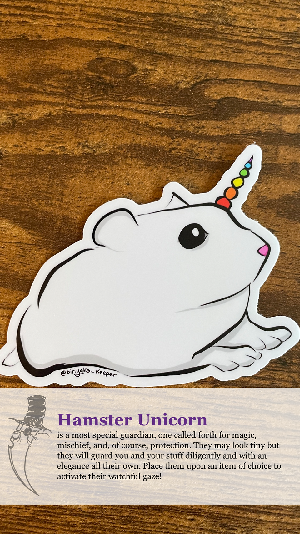sticker of a white hamster with a rainbow unicorn horn