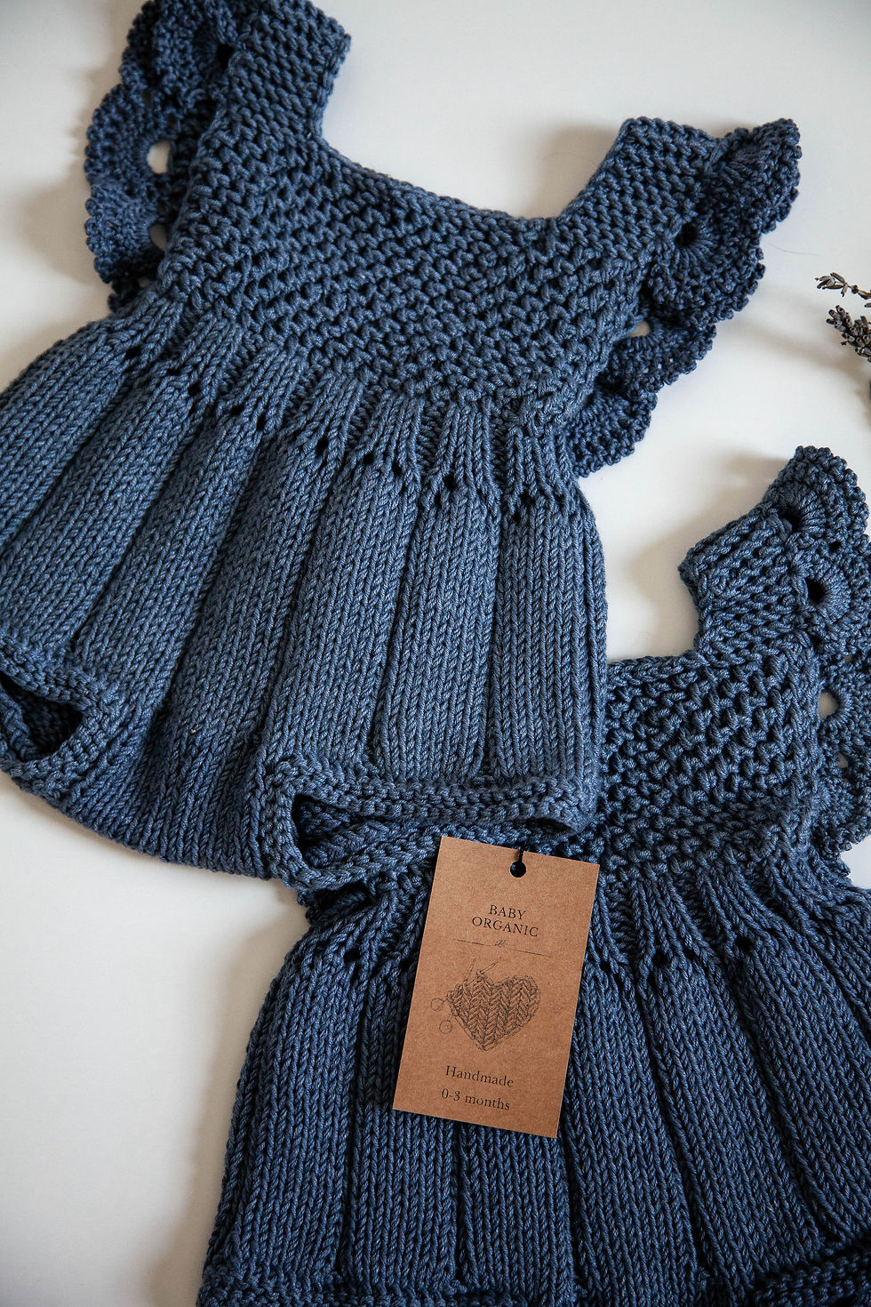 Thumbnail: KNITTED BABY ROMPER – BLUE