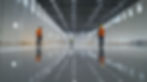 three-construction-workers-standing-shiny-floor-large-empty-warehouse.jpg