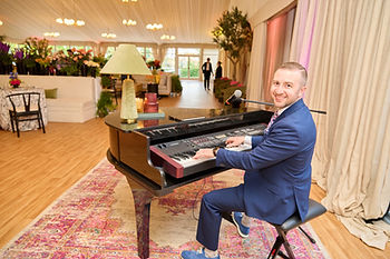 Steve Laureti corporate event pianist performing during Masters Week at a private hospitality house in Augusta, Georgia.