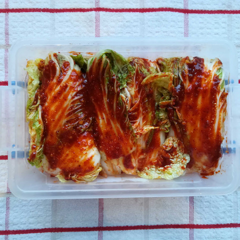 Kimchi in a plastic container