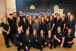 Dr. Roberts and Dr. Locke with their team at Smile Clinic Utah