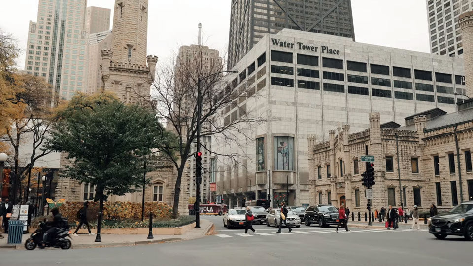 Chicago streets with people in front of Water Tower Place