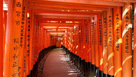 Sacred Fushimi, Kyoto, with Fushimi Inari’s thousand torii gates and forested shrines near Fushimi-Inari Station. Ideal for tourists and locals seeking Japan travel spirituality, culture, and history, capturing Kansai’s divine charm in every serene Japan travel moment.
