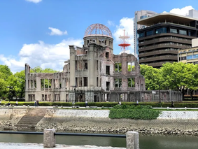 Naka-ku, Hiroshima, with Peace Memorial Park and Atomic Bomb Dome along Motoyasu River near Hiroshima Station. Ideal for tourists and locals seeking Japan travel history, peace, and cultural reflection, capturing Hiroshima’s resilient spirit in every poignant Japan travel moment.