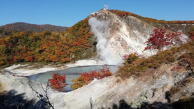 Steamy Noboribetsu, Hokkaido, with Hell Valley’s volcanic trails and world-class onsens near JR Muroran Line. Ideal for tourists and locals seeking Japan travel wellness, nature, and hot springs, capturing Hokkaido’s primal charm in every geothermal Japan travel moment.