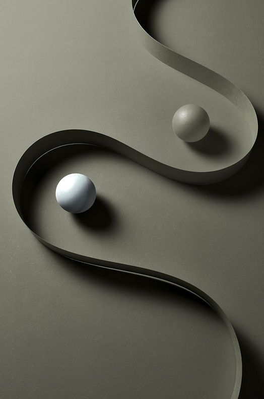Two balls nesting between a twisted shape
