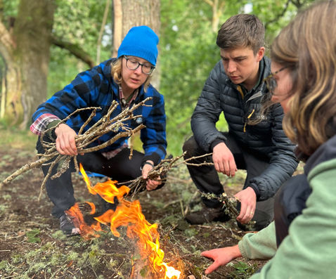 learning to light fires on a bushcraft course