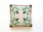 hand-painted cushion with thistles and leaf design