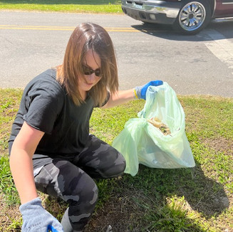 Bea picking up trash 2.jpeg